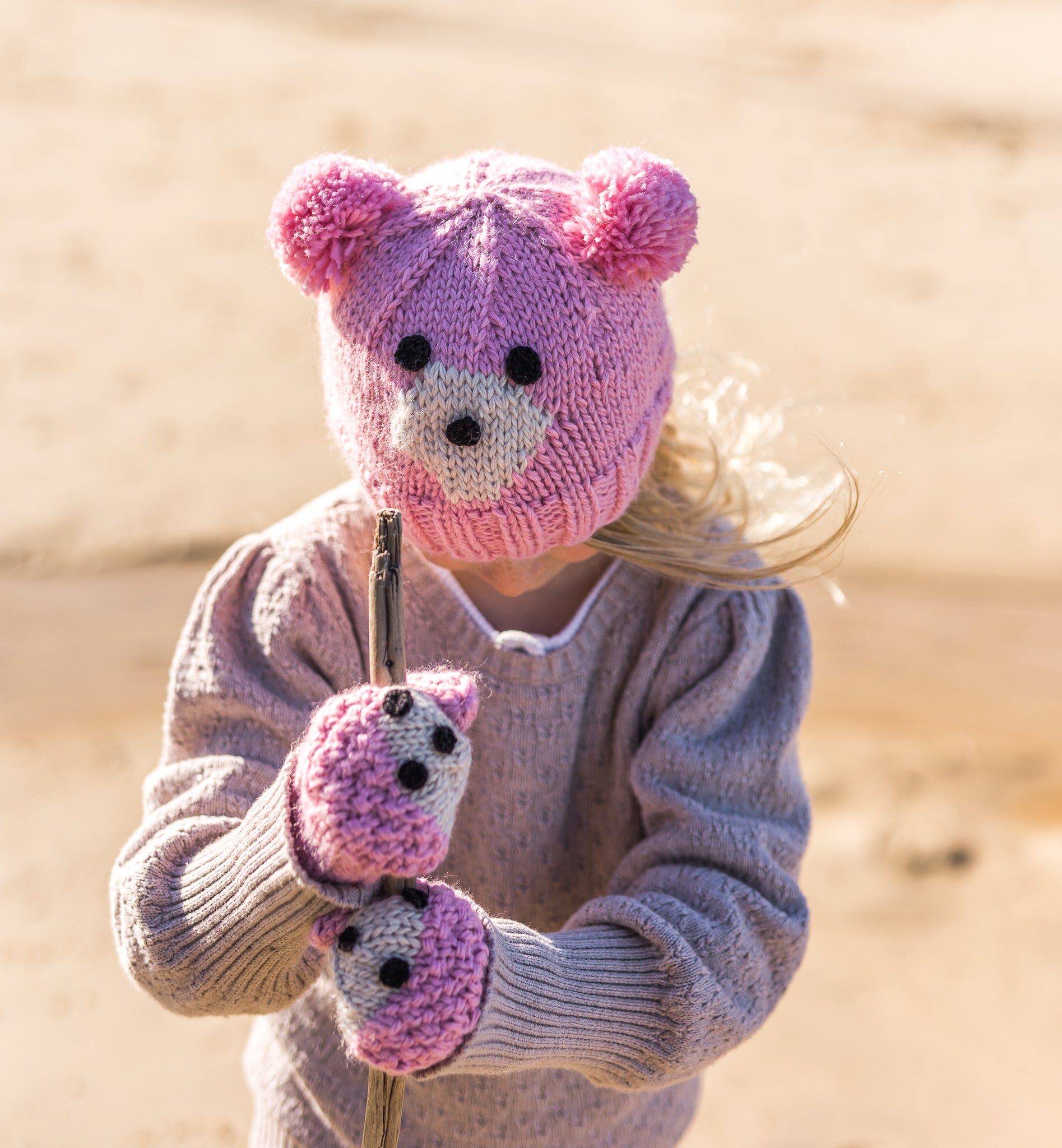 Knitted teddy bear store faces